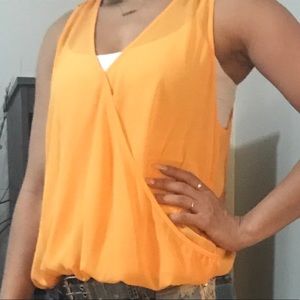 Orange sleeveless top